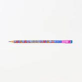 A colorful wooden pencil with a blue body, vibrant multicolor floral pattern, a pink ferrule, and a blue eraser shown horizontally against a plain white background.
