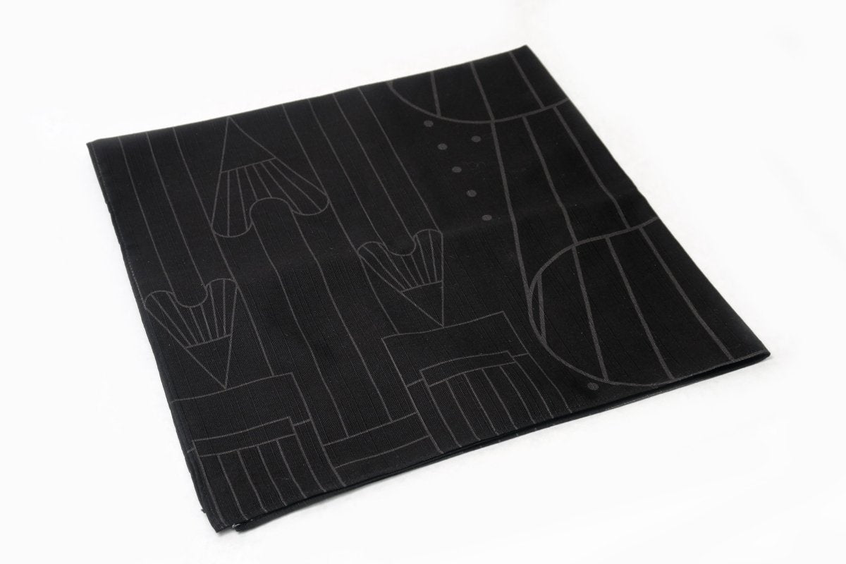 A Blackwing Furoshiki (Japanese Cloth Wrapping Paper) with a stylish drawing on it. A Blackwing Furoshiki (Japanese Cloth Wrapping Paper) with a stylish drawing on it.