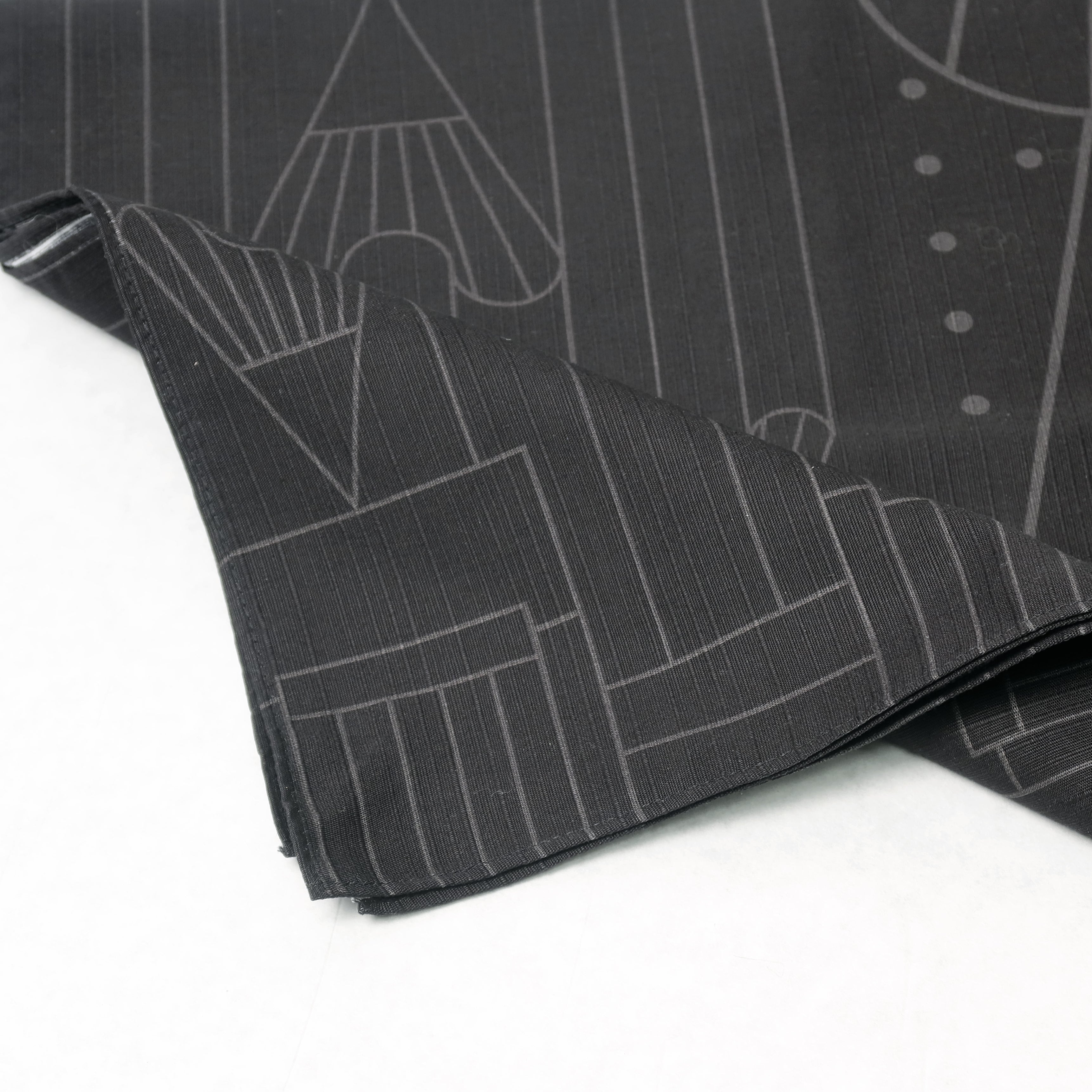 A Blackwing Furoshiki with a design on it, perfect for adding a touch of style to any outfit.