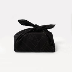 An eco-friendly Blackwing Furoshiki adorned with a black bow. An eco-friendly Blackwing Furoshiki adorned with a black bow.