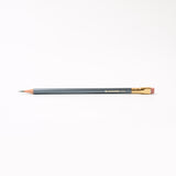 A Blackwing 602 (Set of 12) pencil is resting on a white surface.