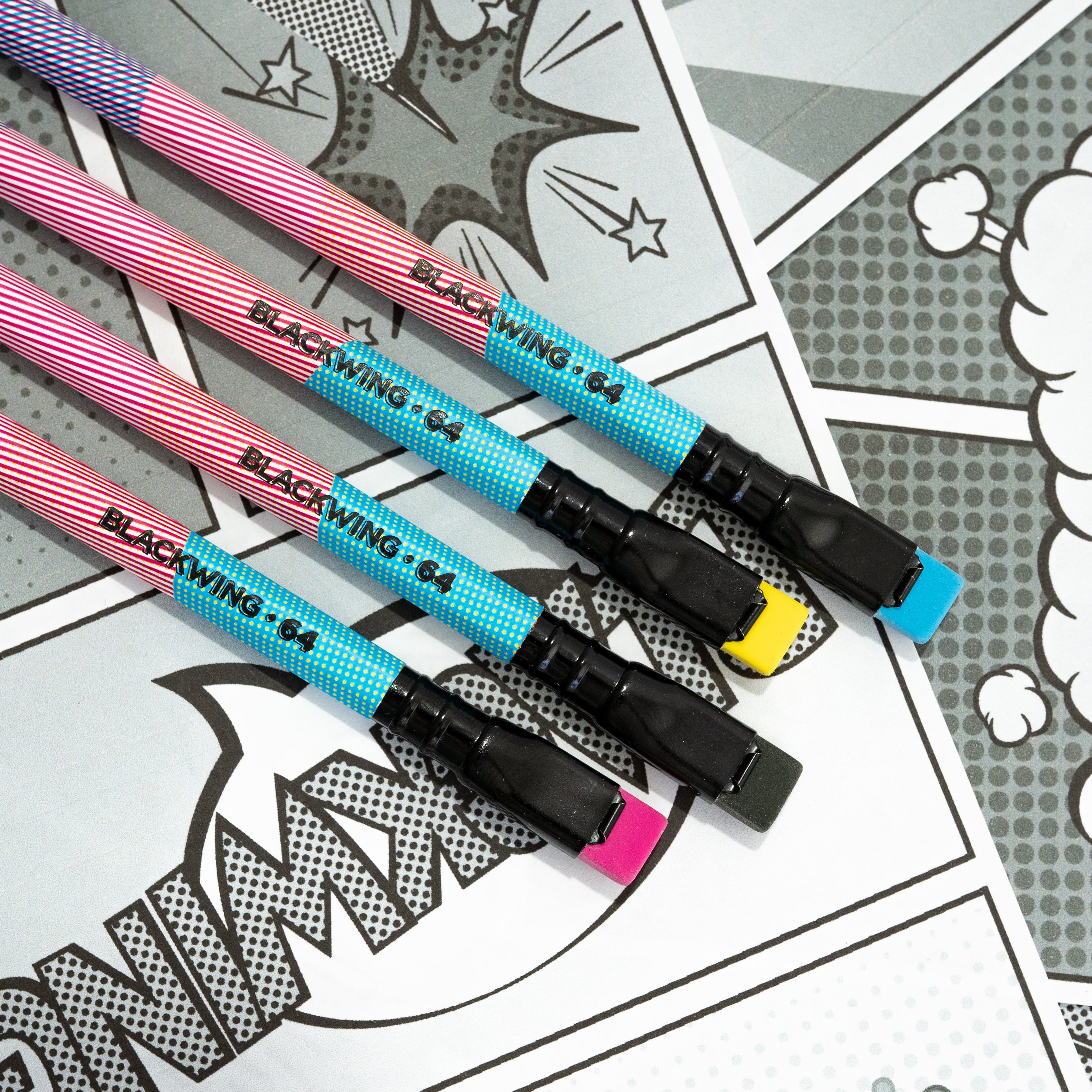 Colorful Blackwing Volume 64 replacement erasers on a comic book-style background.