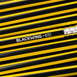 A group of Blackwing Volume 651 (Set of 12) pencils with the word blackwing on them, inspired by Bruce Lee.