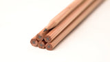 A group of Blackwing Natural (set of 12) pencils with Incense-cedar barrels on a white surface.