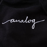An Analog Hoodie with white text inspired by the Blackwing pencil.