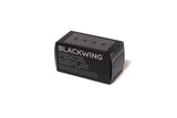 A black box with the word "Blackwing Upright Four Pencil Display" beautifully displayed on it.