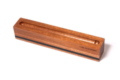 A pencil with black stripes, resembling a Blackwing Flat Single Tube Display. A pencil with black stripes, resembling a Blackwing Flat Single Tube Display.