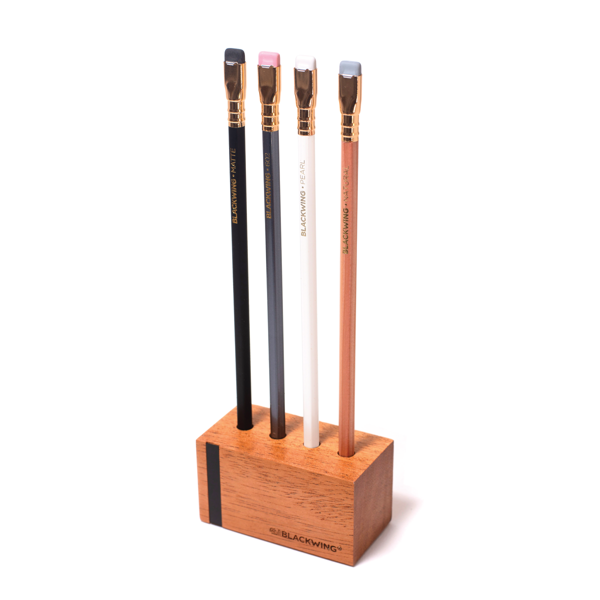 A mahogany pencil holder displaying four Blackwing Upright Four Pencil Display pencils.