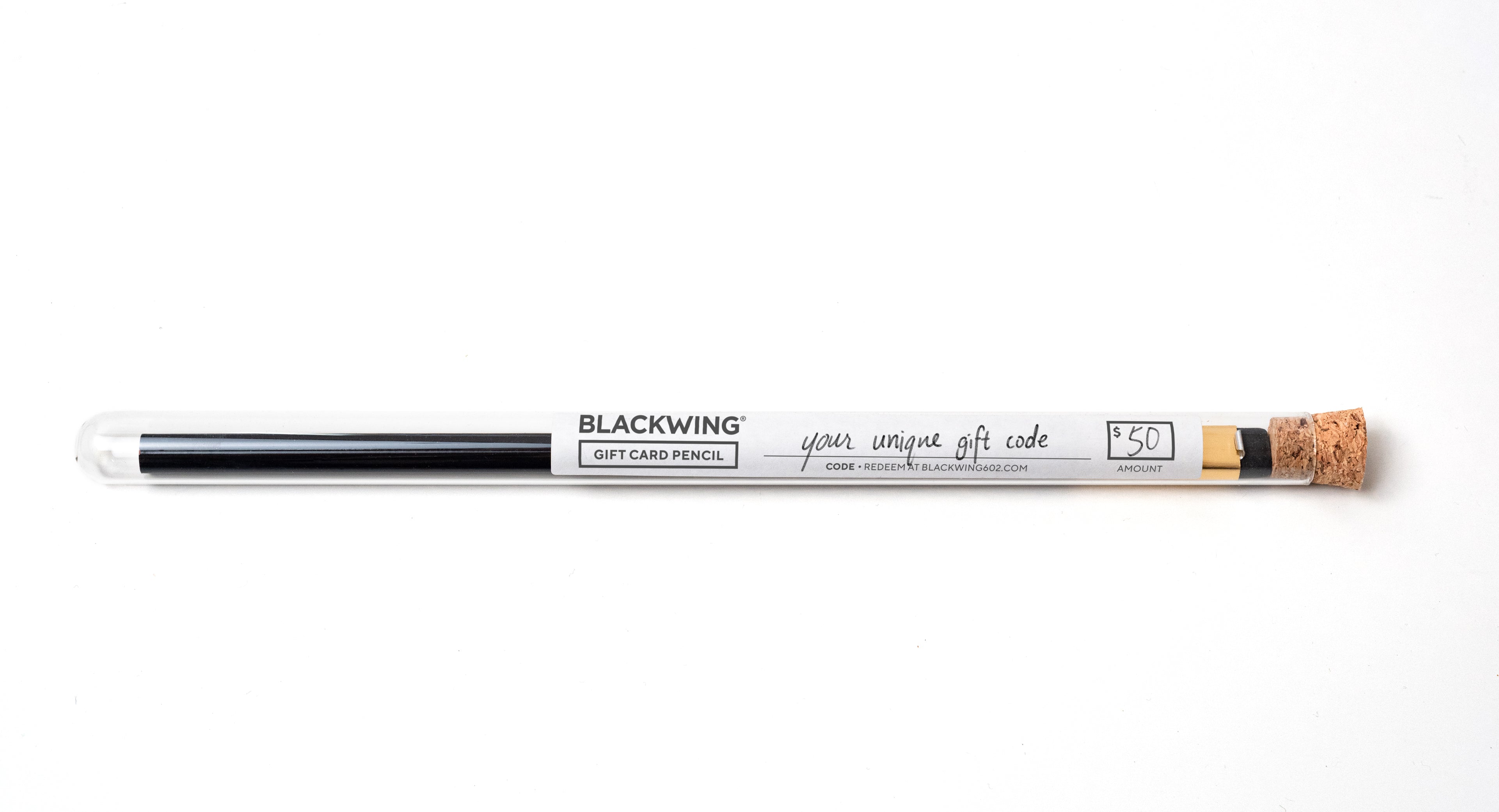 A Blackwing Gift Card Pencil with a black cap on a white surface.