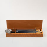 A set of Blackwing French Wood Box pencils.