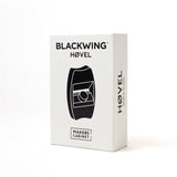 A white box with black text, possibly containing a Blackwing Høvel.