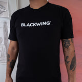 A man wearing a Blackwing Logo Shirt in California.