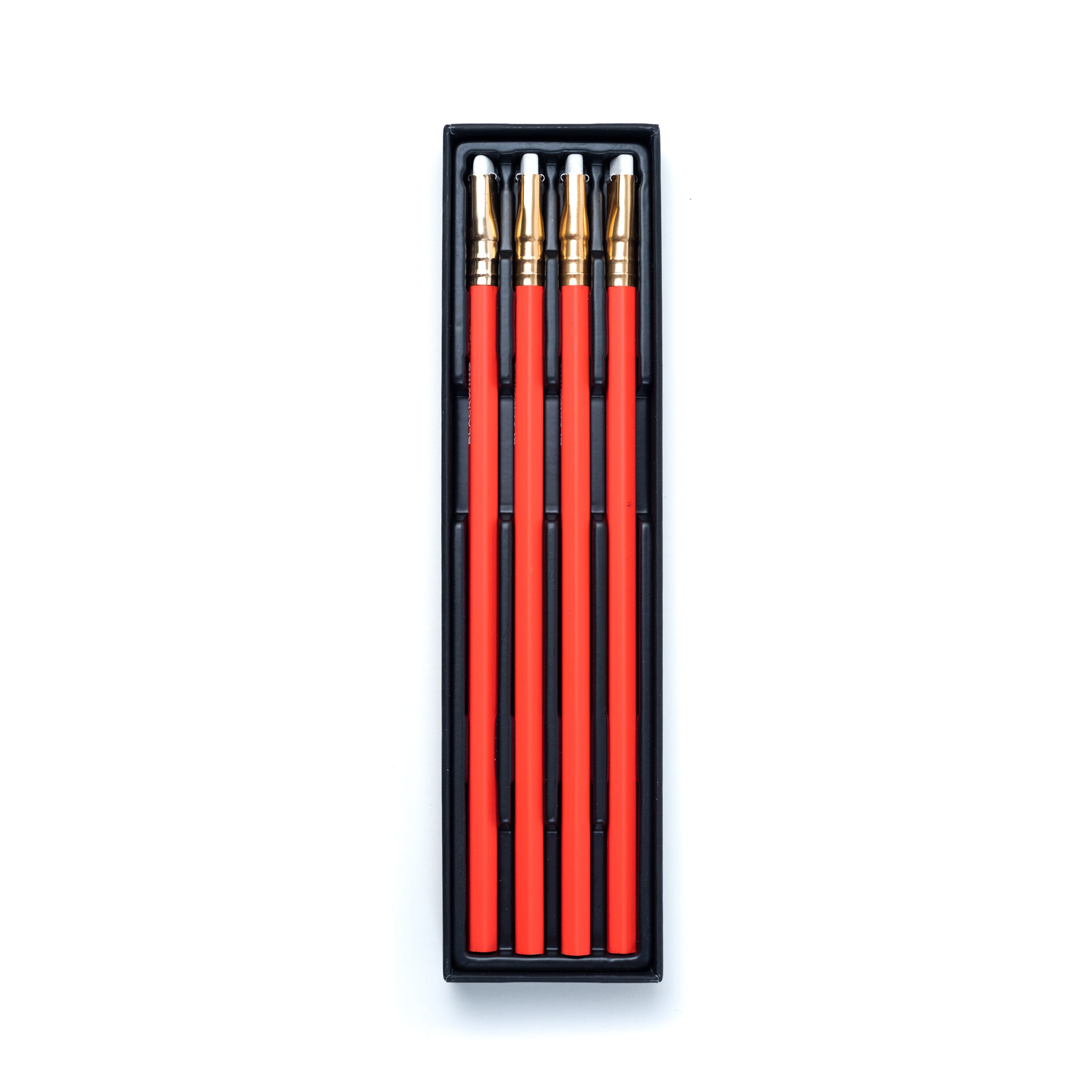 A set of Blackwing Red pencils in a black box, perfect for sketching or editing.