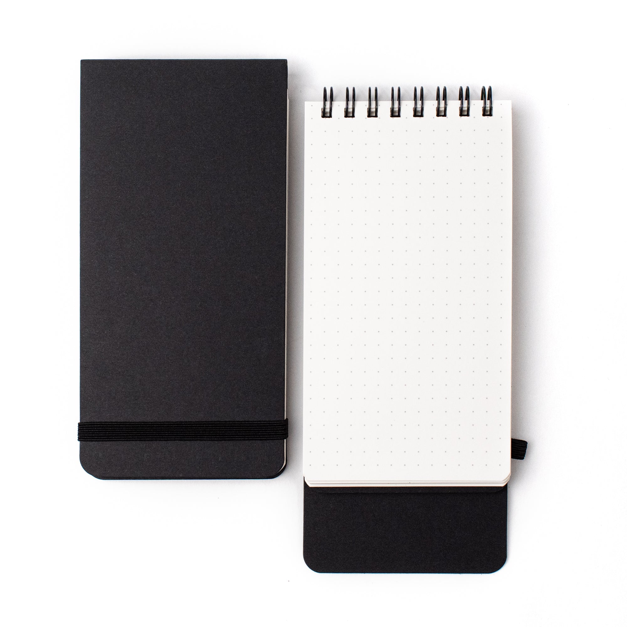 A Blackwing Reporter Pads (Set of 2) with a black cover, perfect for note-taking or sketching, set against a white background.