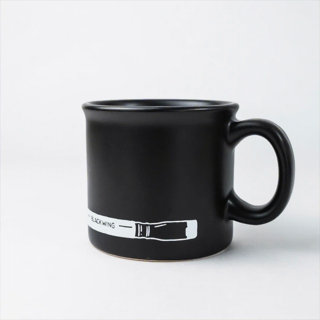 A Blackwing Coffee Mug with white writing, inspired by the Blackwing pencil.