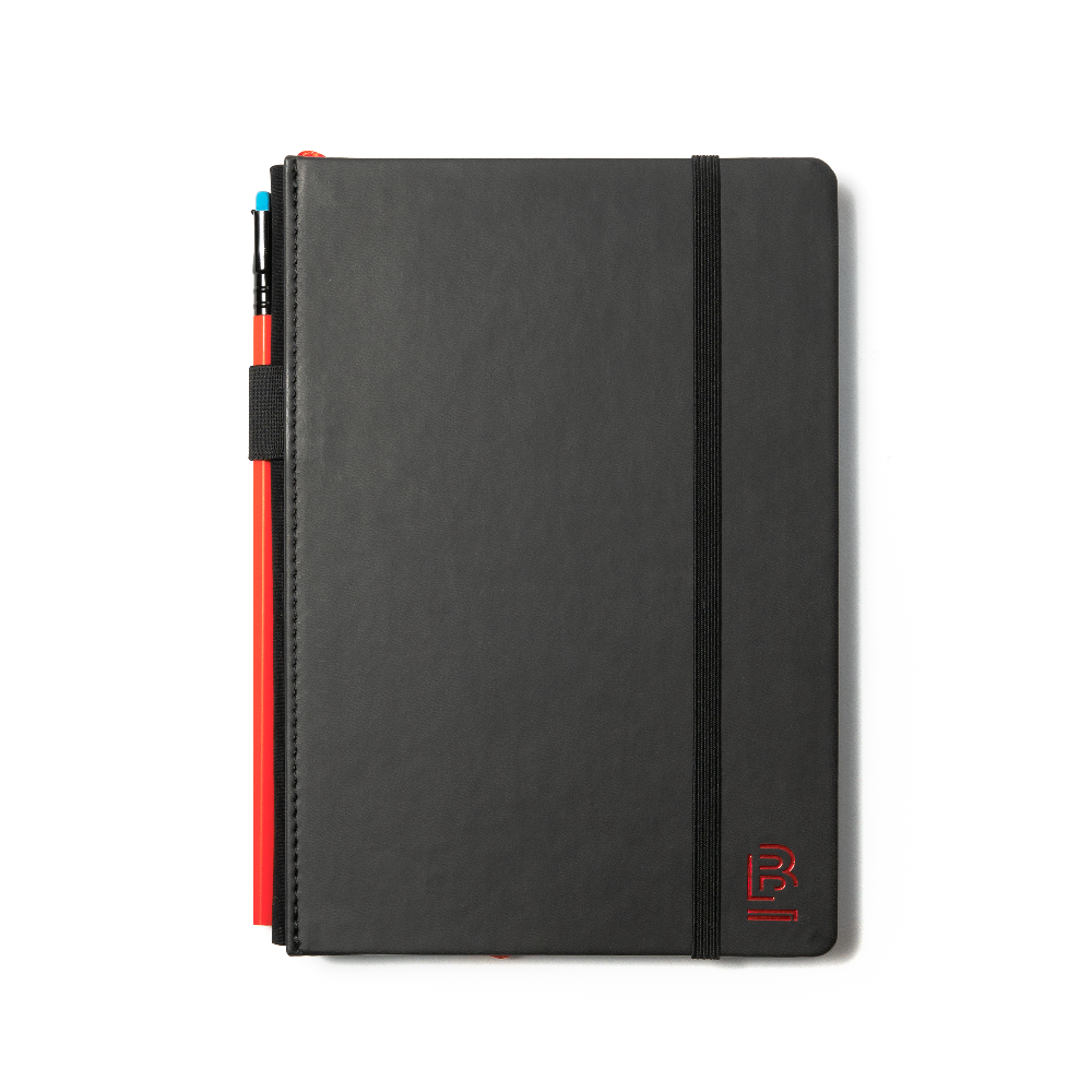 A Blackwing Volume 6 Medium Slate Notebook with a red pen, perfect for sparking an entrepreneurial spirit.