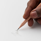 hand writing with a Blackwing Natural Pencil on paper