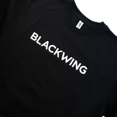 Close-up of a black crewneck sweatshirt with 'BLACKWING' embroidered in white across the chest.