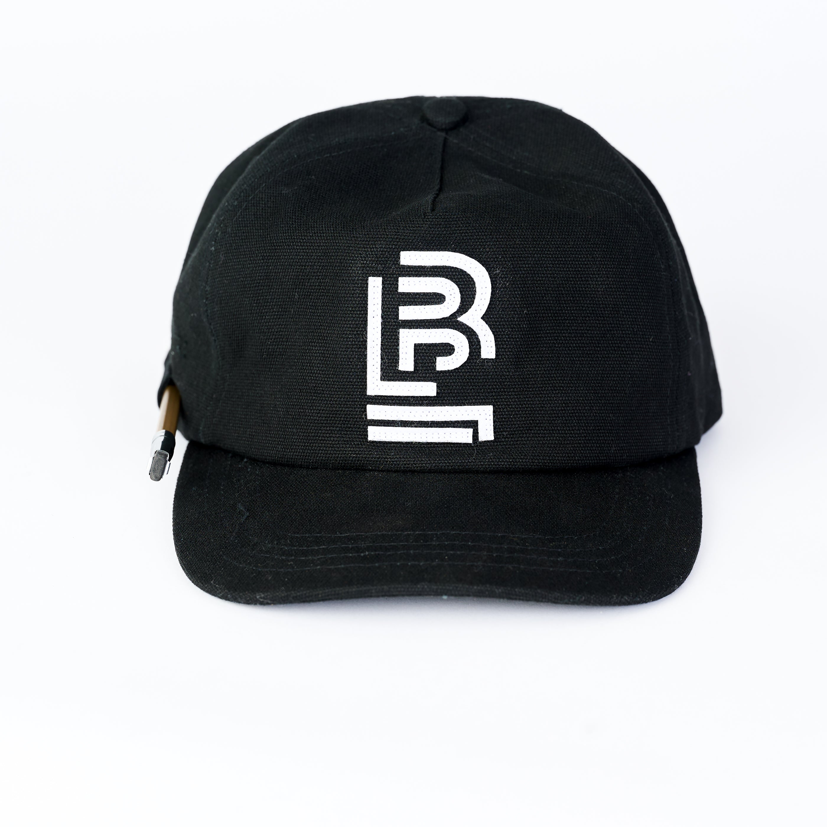 Canvas black cap with white Blackwing emblem embroidered on the front and pencil loop on side.