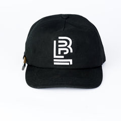 Canvas black cap with white Blackwing emblem embroidered on the front and pencil loop on side.