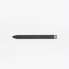 Black pen with 'BLACKWING' wordmark on barrel and a grey clicker on a white background