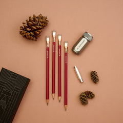 Blackwing Pencil Essentials Gift Set with Red Matte pencils, silver one-step sharpener, and silver point guard
