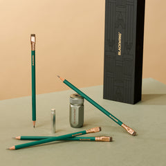 Blackwing Pencil Essentials Set with Matte Green pencils, silver one-step sharpener, and silver point guard