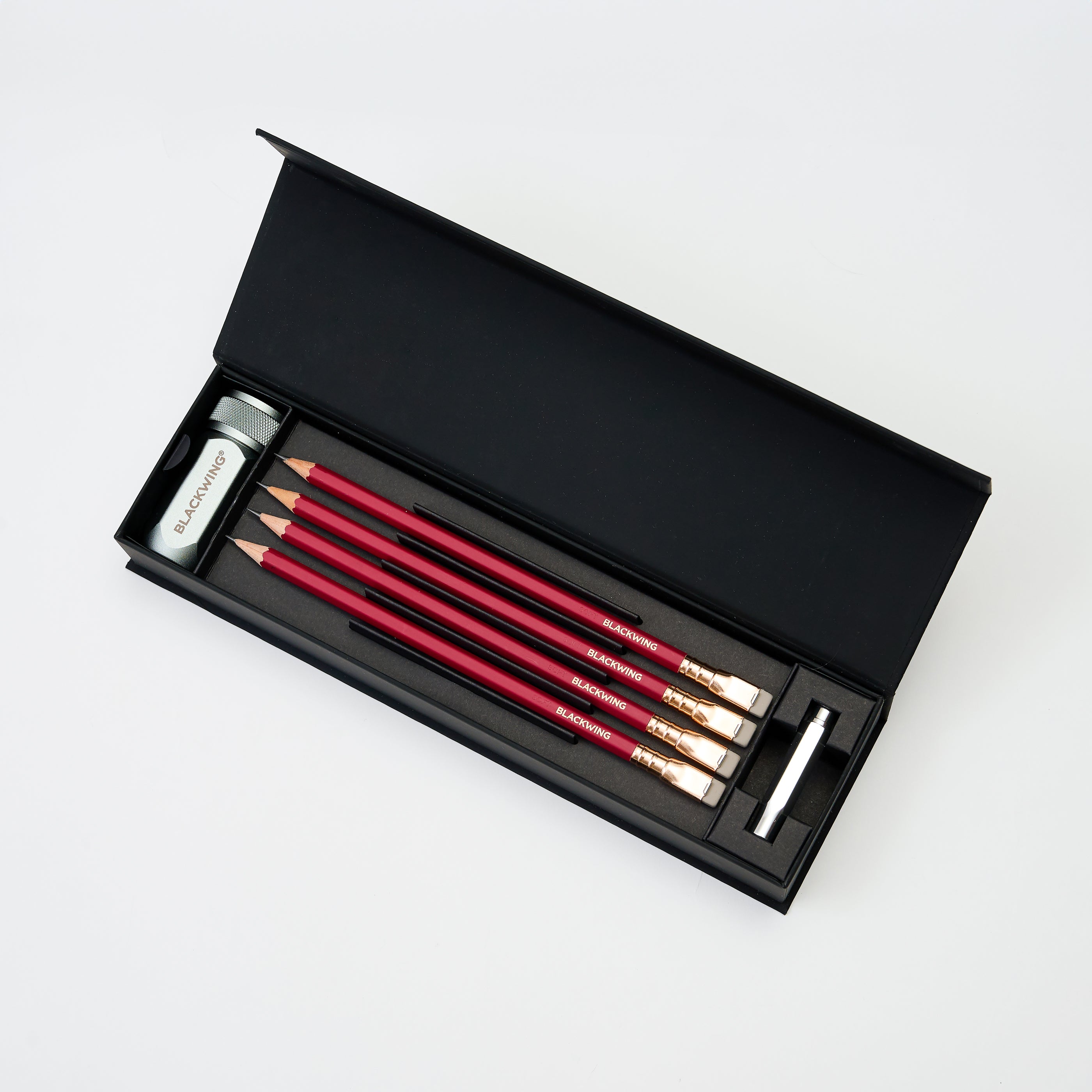 Blackwing Pencil Essentials Set with 4x Matte Red pencils, silver one-step sharpener, and silver point guard