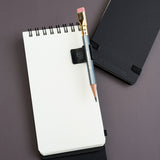 Blackwing Notebook Clip on reporter pad