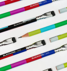 Colorful Blackwing pencils with 'Blackwing 343' imprinted in silver arranged on a white surface