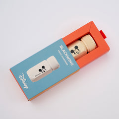 Disney Blackwing Pencil Sharpener in a red and blue rectangular box, featuring a beige pencil sharpener with a black Mickey Mouse head graphic.