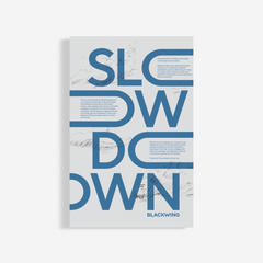 Manifesto Print featuring a slow down graphic on grey cardstock