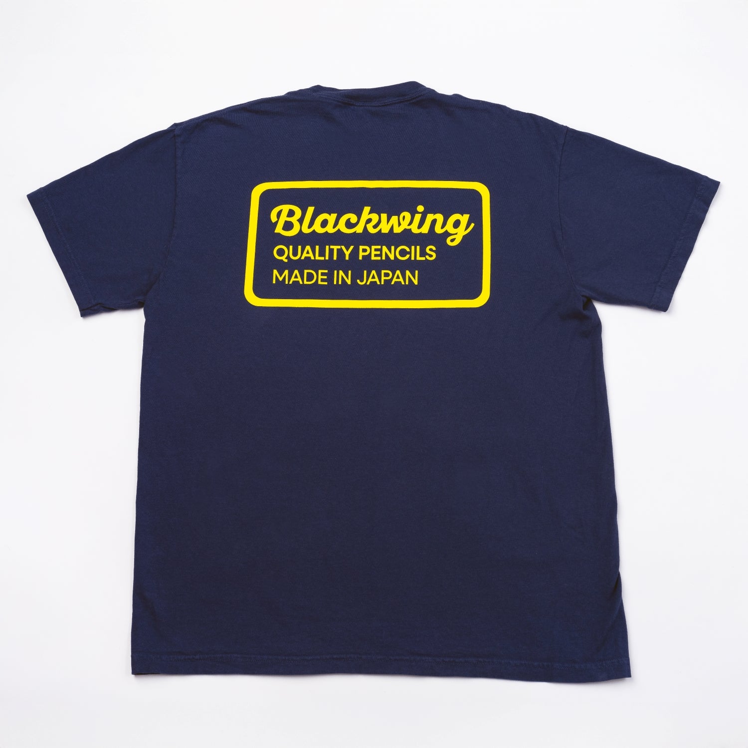 Navy blue 100% cotton t-shirt with yellow "Blackwing, Quality Pencils Made in Japan" text print across upper back.