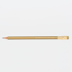 gold pencil with imprint 'THE BETTER ANGELS OF OUR NATURE' on a white background