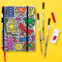 Blackwing Volume 292 Keith Haring gift set includes a notebook, four pencils, a red point guard, and a white one-step sharpener