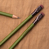 Two Blackwing Volume 17 (Set of 12) gardening pencils on a brown cloth.
