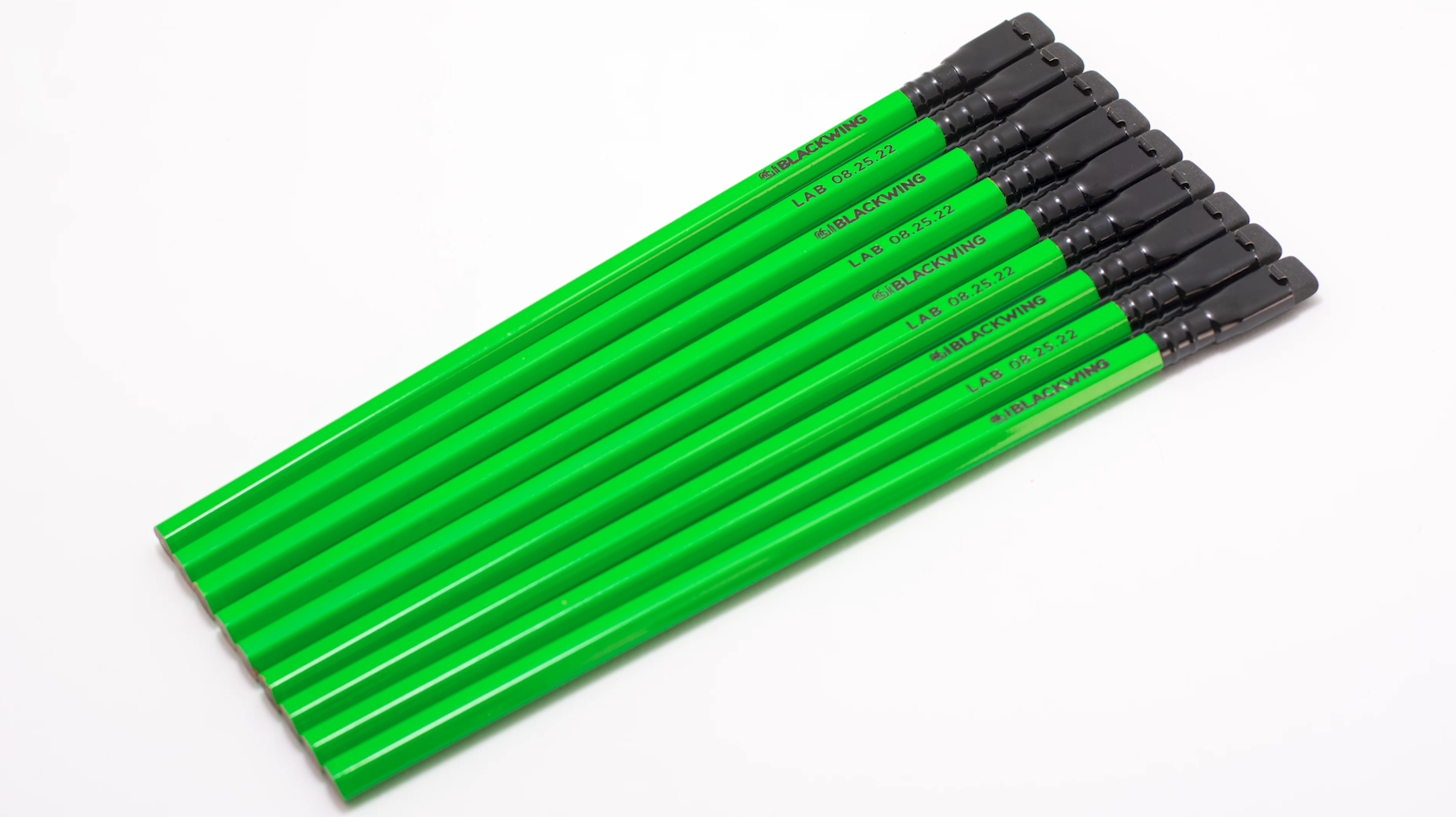 Blackwing Lab 08.25.22 - Set of 12: A cluster of green pencils on a white surface.