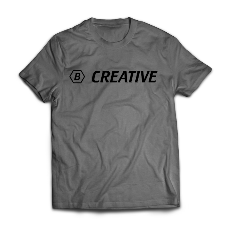 A "Be Creative" T-Shirt - Grey with the word "creative" printed on it.