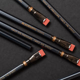 Blackwing Eras have a dark grey barrel, iconic dark grey ferrule with a gold stripe, dark gold imprint, red eraser, and our extra-firm graphite.