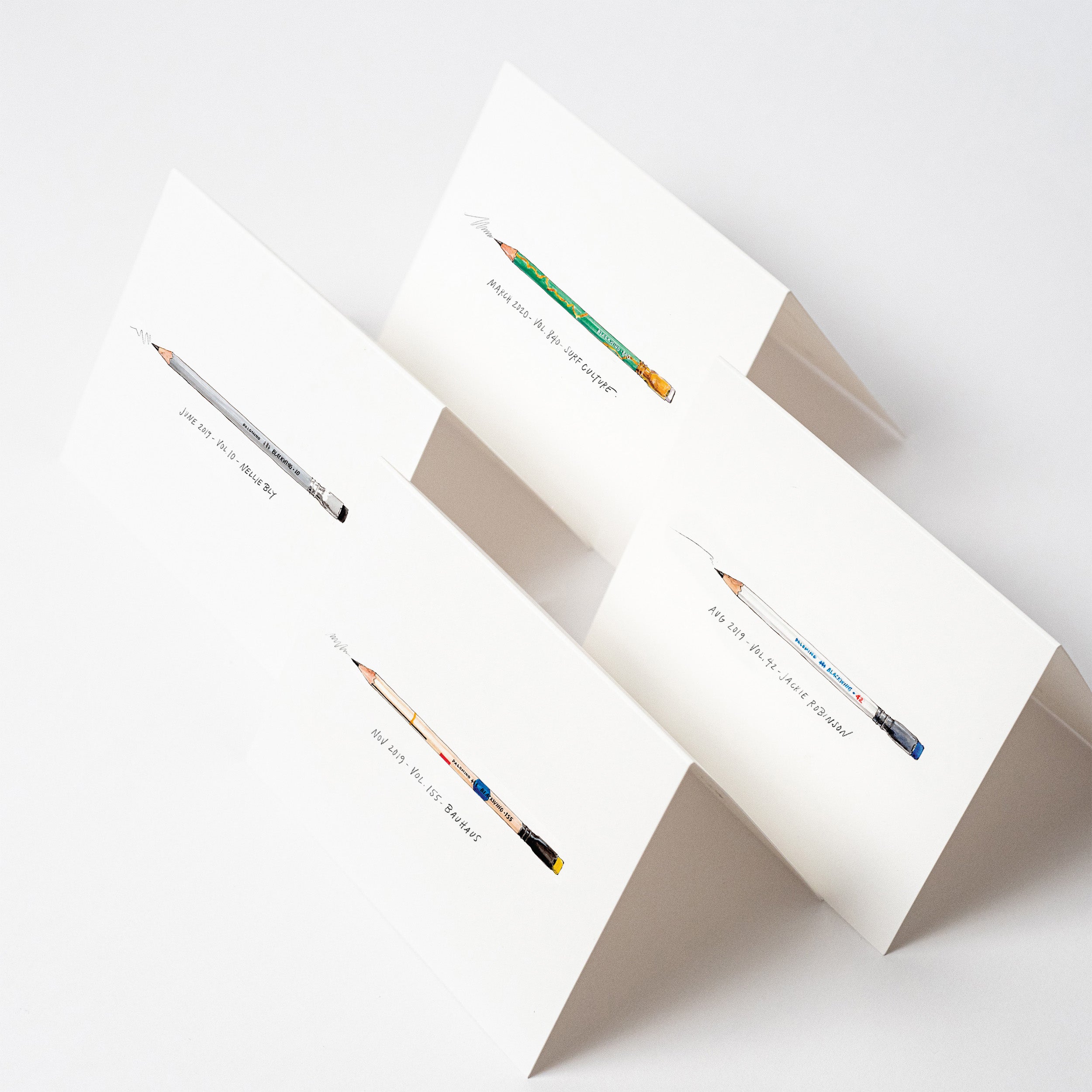 Four limited edition Blackwing Volumes Notecards with pencils on them designed by Blackwing Maker.